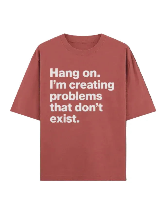 Red t-shirt with white text on a dark background