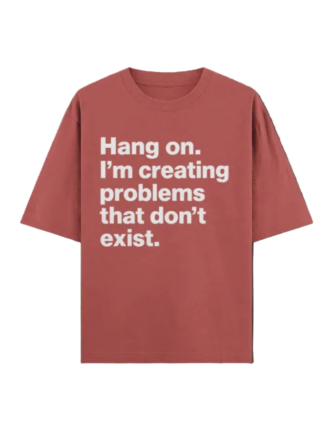 Red t-shirt with white text on a dark background