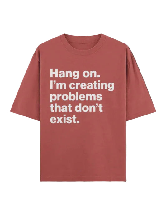 Red t-shirt with white text on a dark background