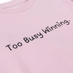 Pink oversized cotton T shirt with Too Busy Winning. text printed in the center1 close up – TRESSNY
