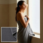 Woman wrapped in a gray towel by a window with a close-up of the towel's texture.