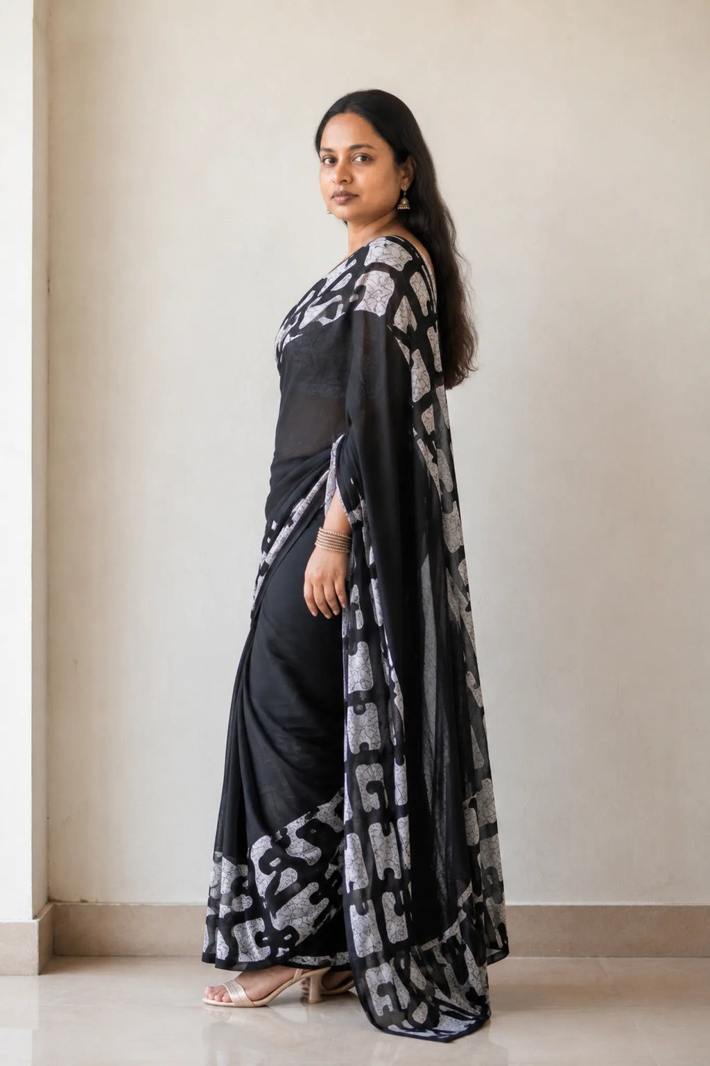 Black Printed Linen Saree with Mirror Work for Festive Wear - Side View | Women Fashion India