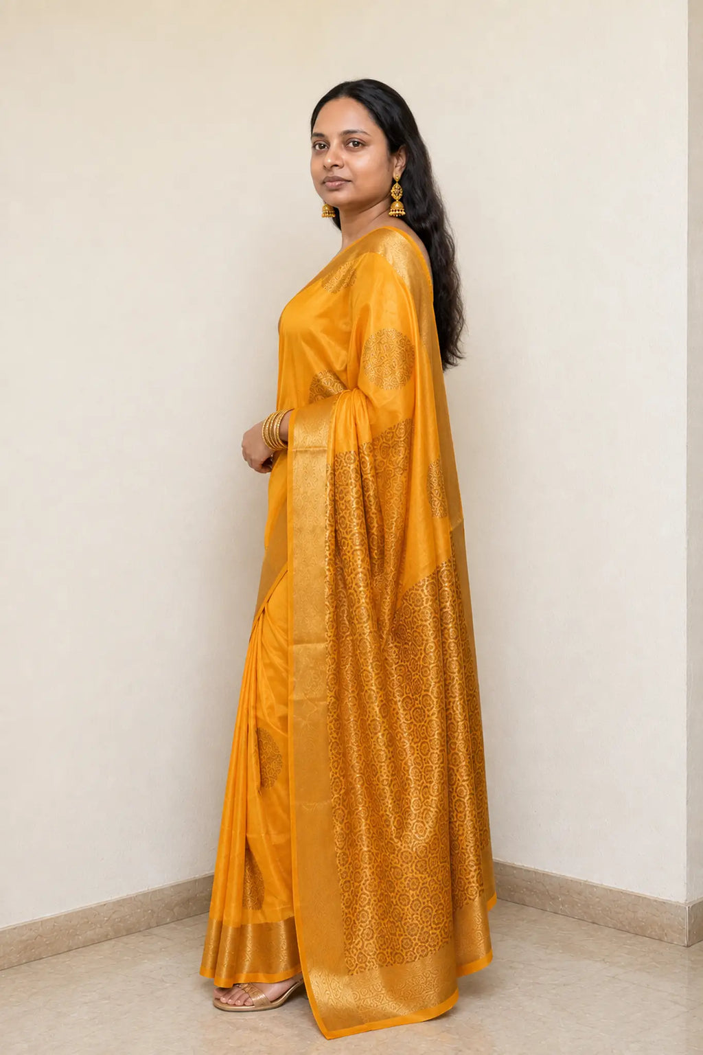 Kanchi Soft Silk Saree with Gold Butta for Festive Wear - Side View | Women Fashion India