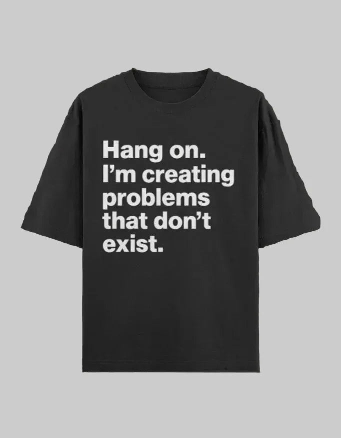 Black t-shirt with white text on a dark background
