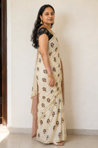 Ivory Printed Linen Saree with Gold Jari Border and Blouse - Print Closeup | Women Fashion India