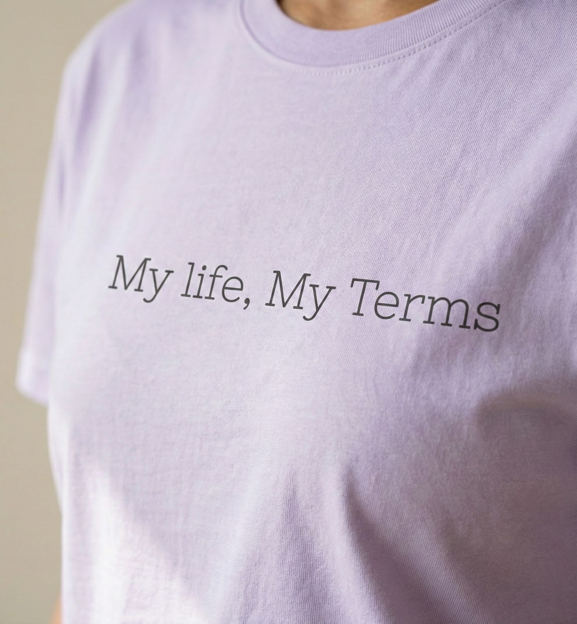 Light purple t-shirt with 'My life, My Terms' text on a plain background